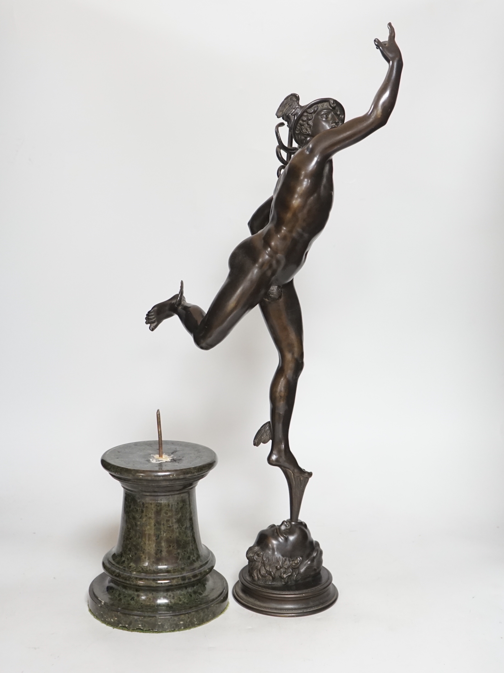 After Giambologna, a bronze figure of Hermes on marble base, early 20th century, 72cm